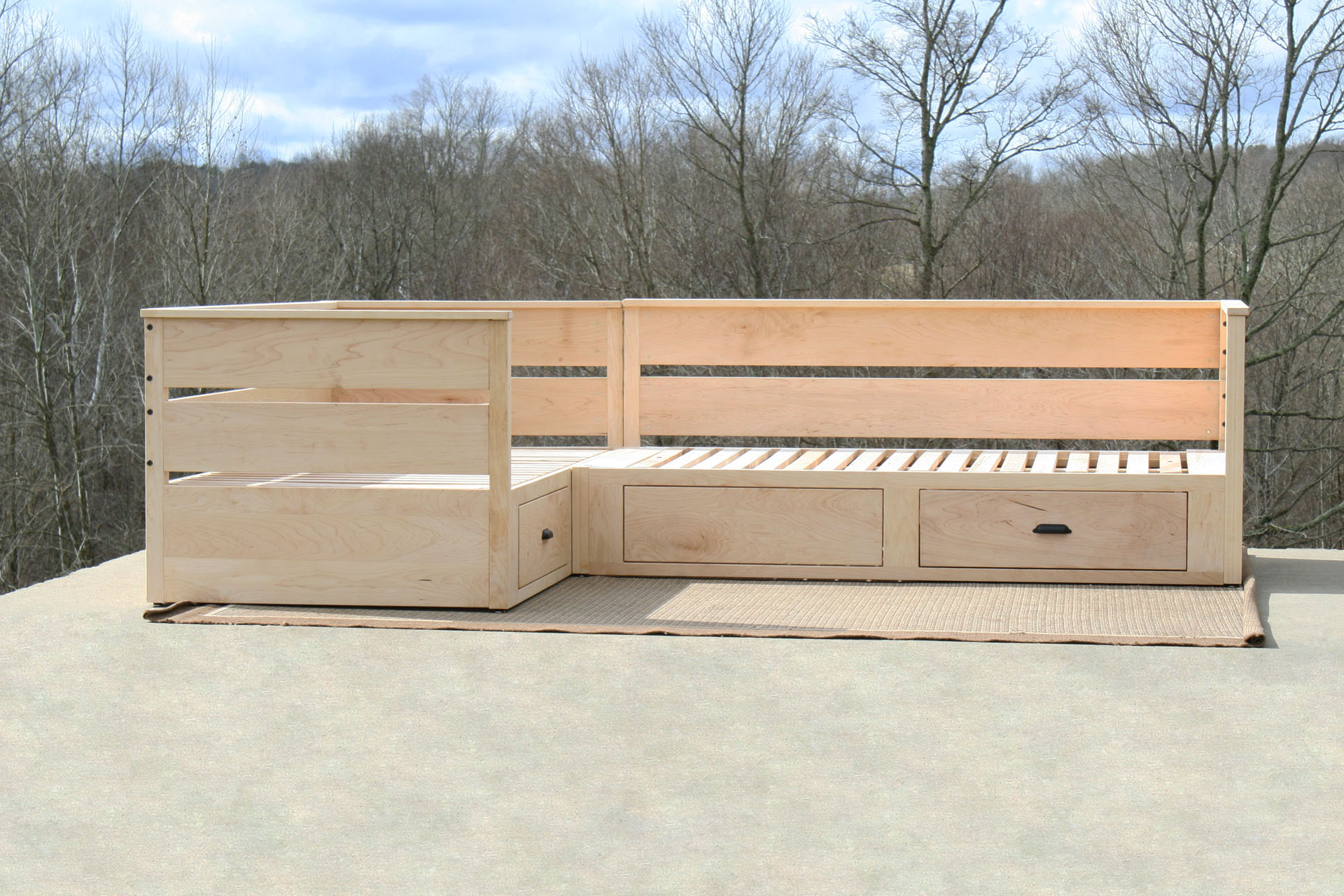 L shaped daybed with storage front view hardwood