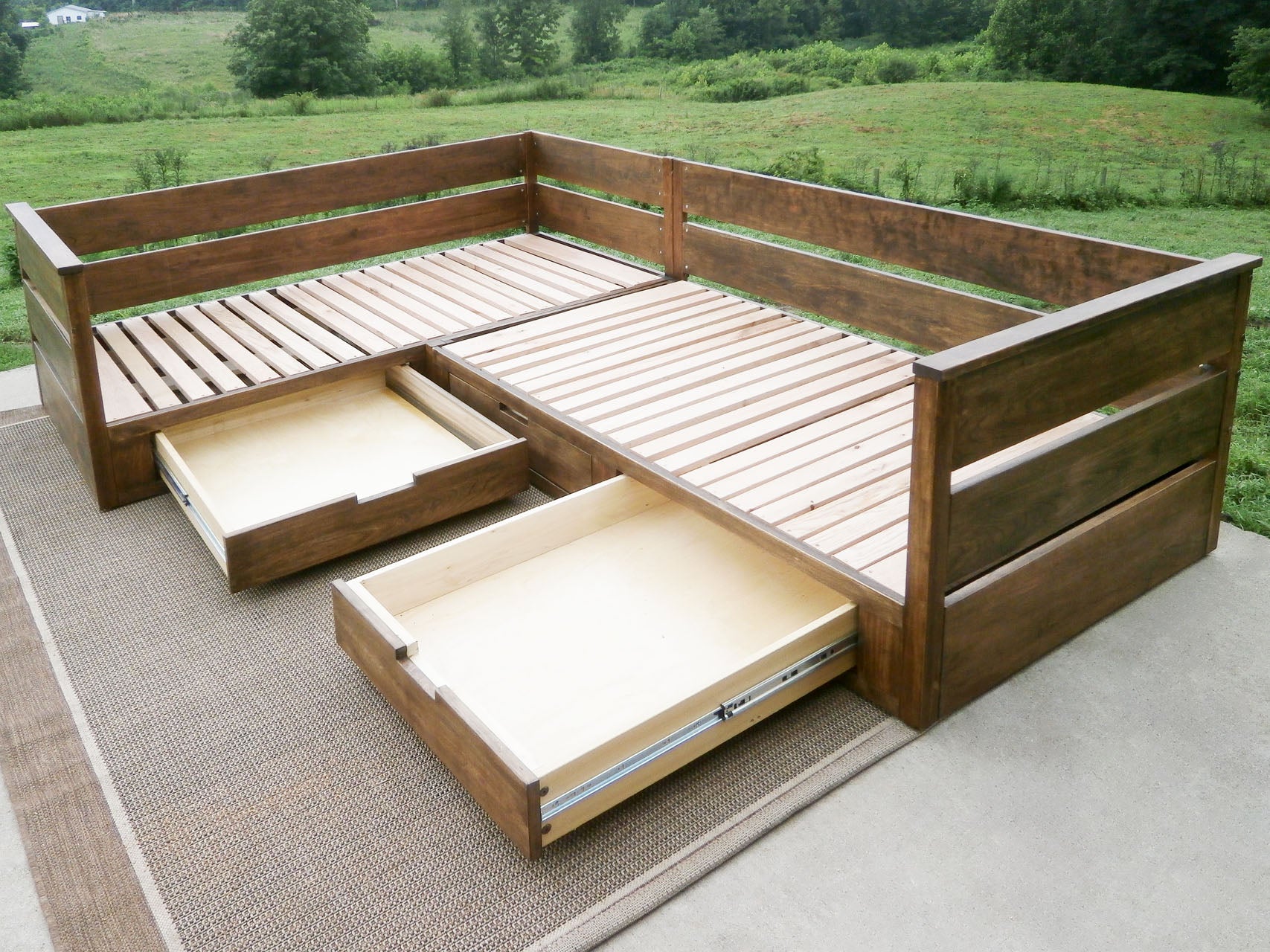 L shaped daybed with storage walnut side view with drawers extended