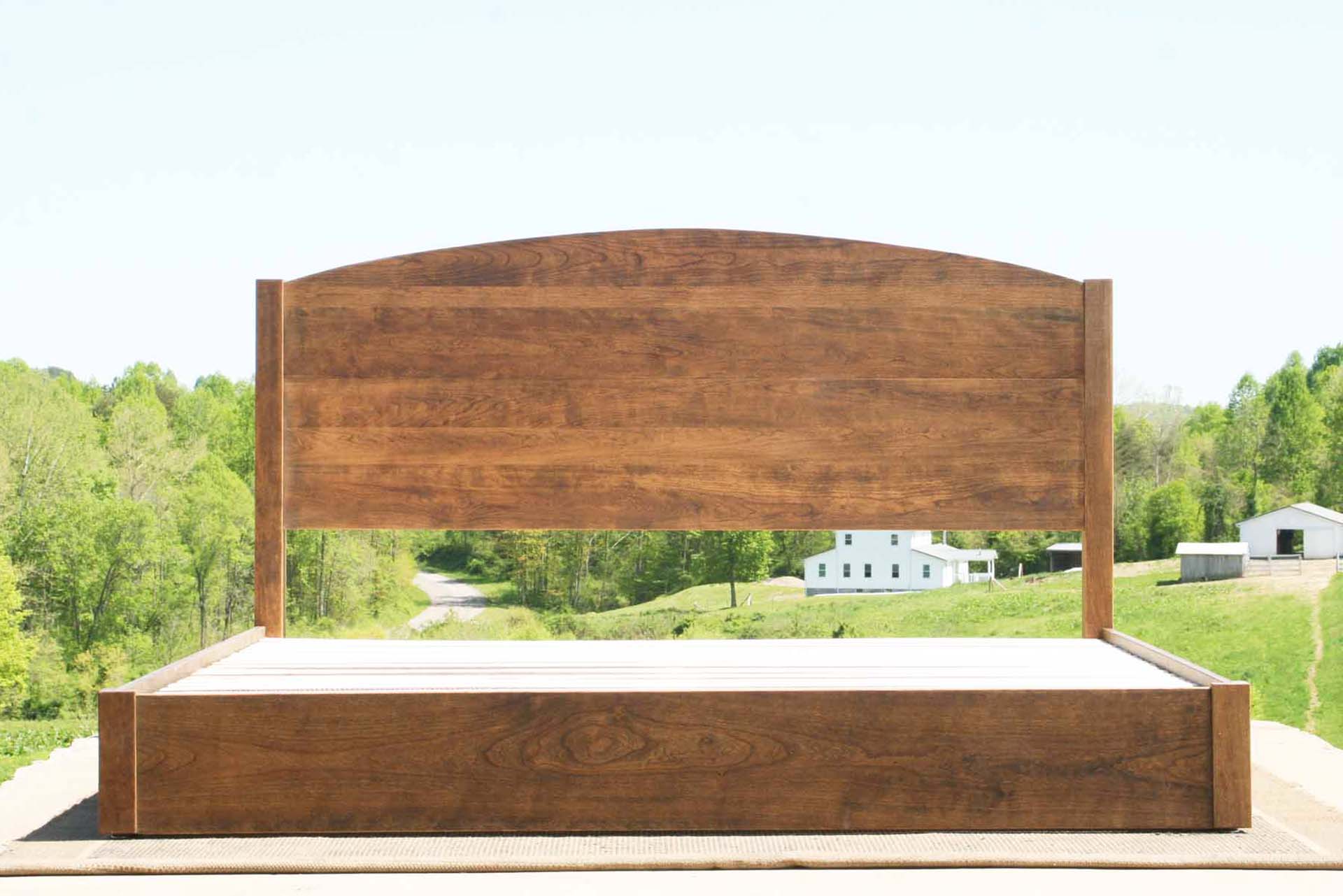 Low Platform Bed with arched headboard front view