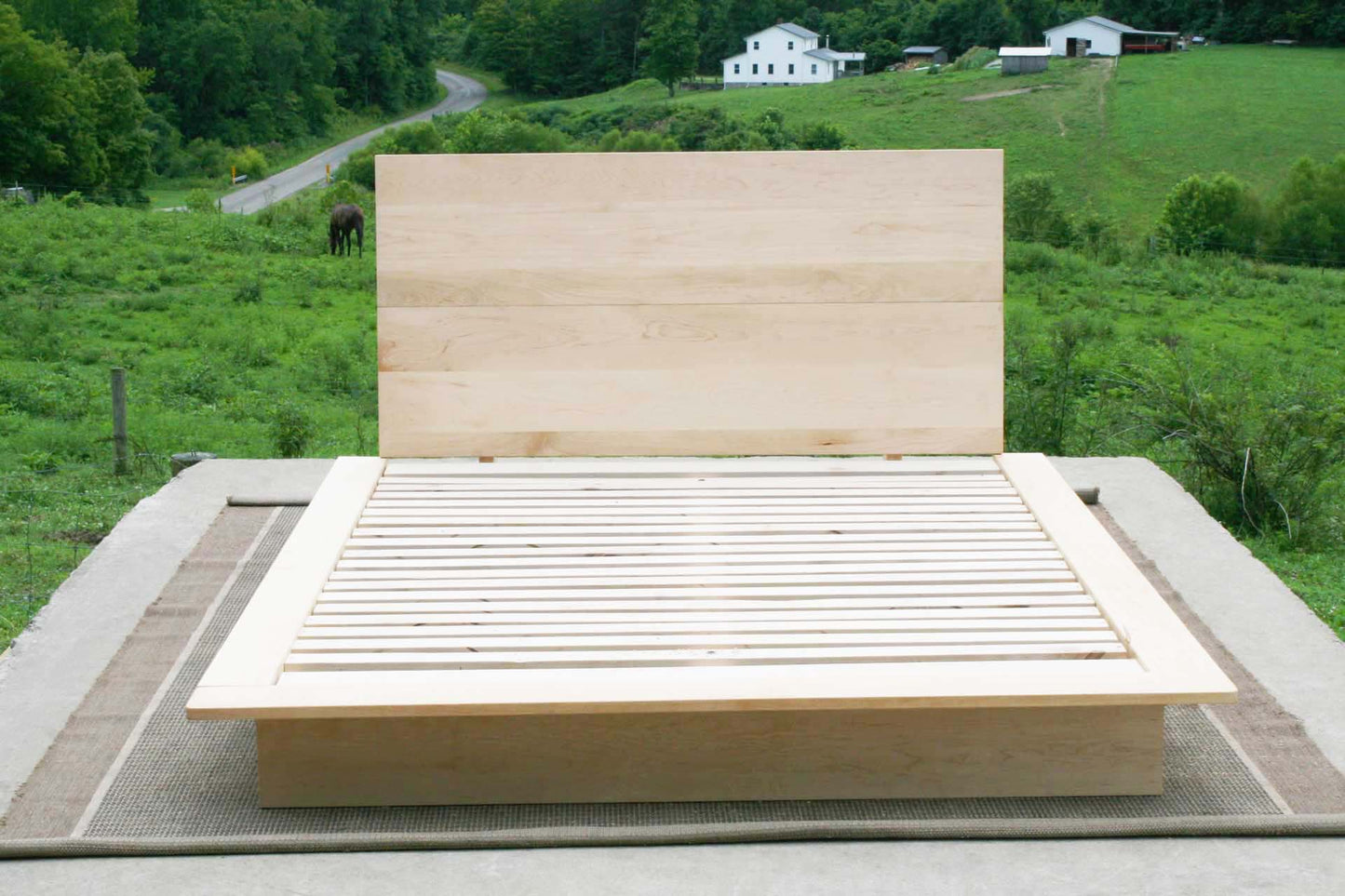 front view natural slanted headboard platform bed
