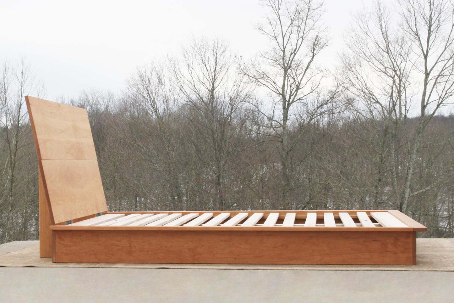 side view slanted headboard platform bed