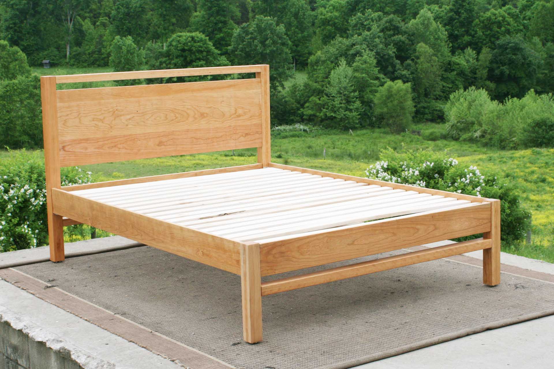 angled view Modern platform bed with headboard