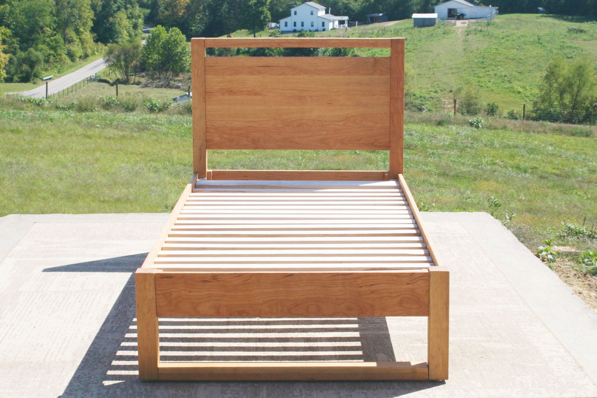 modern platform bed with headboard front angle