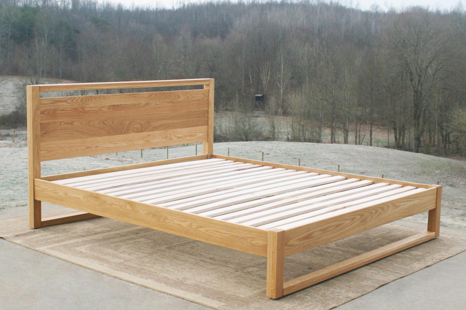 Modern platform bed with headboard angled view