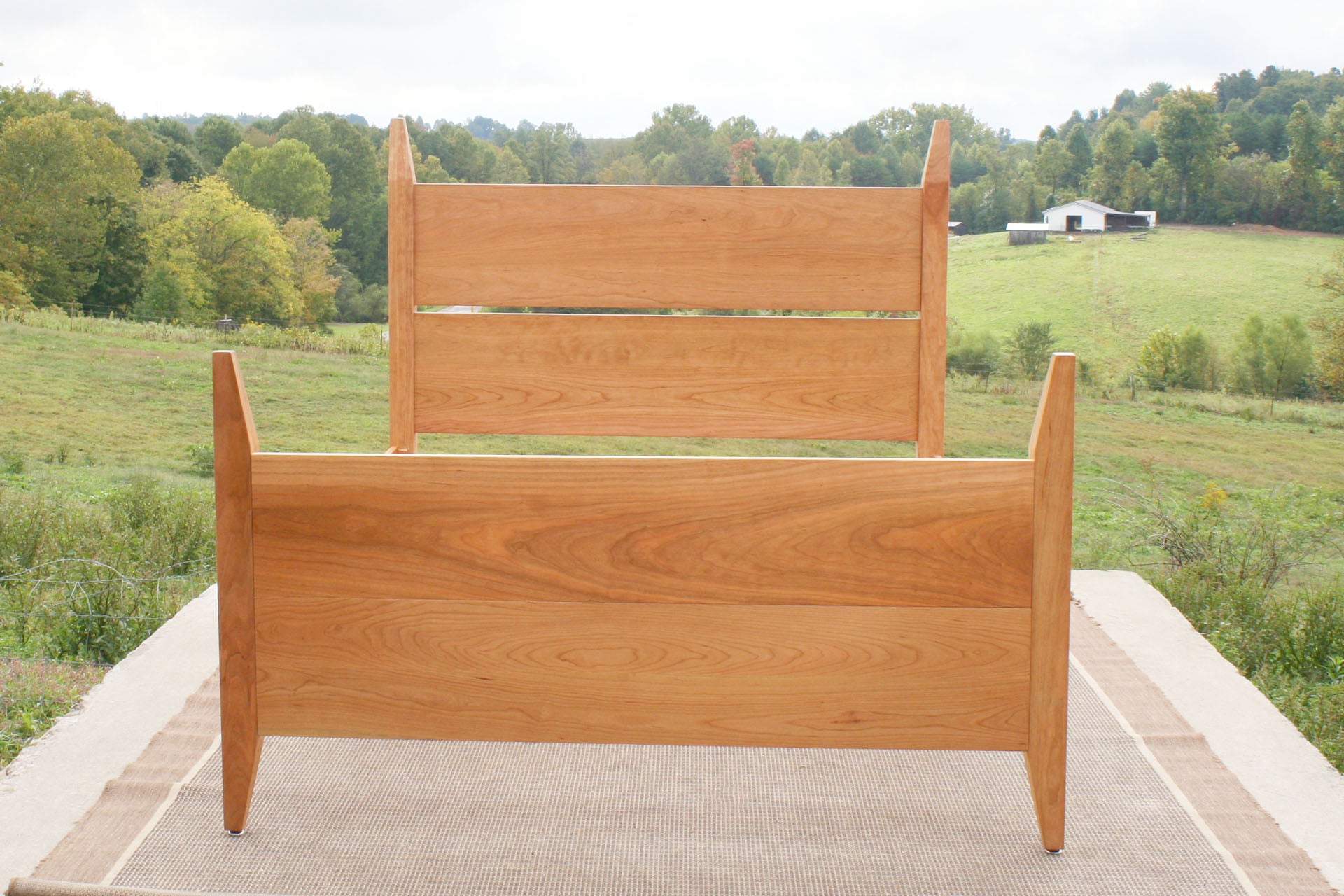 box spring bed with tapered posts close front view