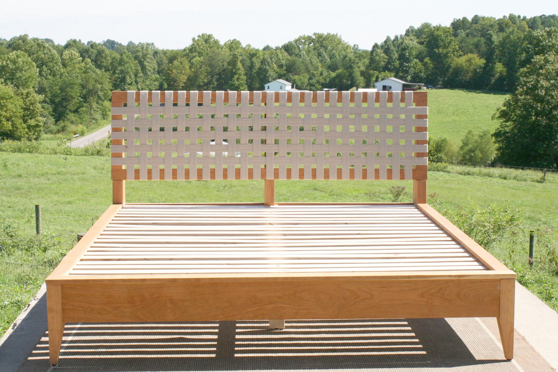 woven headboard of solid custom platform bed front view