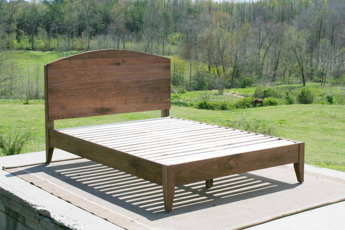 bed with tall headboard