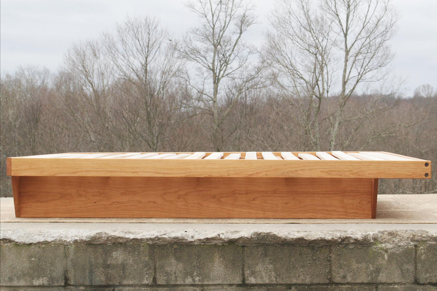 custom cherry wood low platform bed frame side view