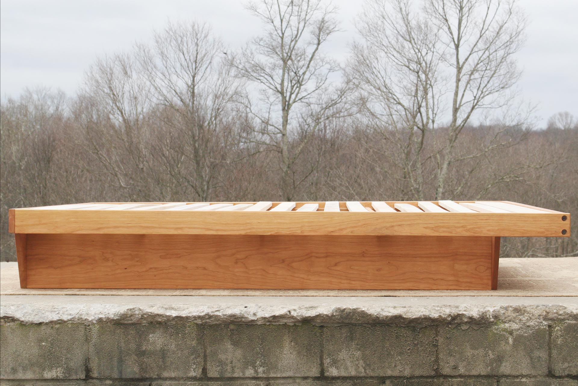 custom cherry wood low platform bed frame side view