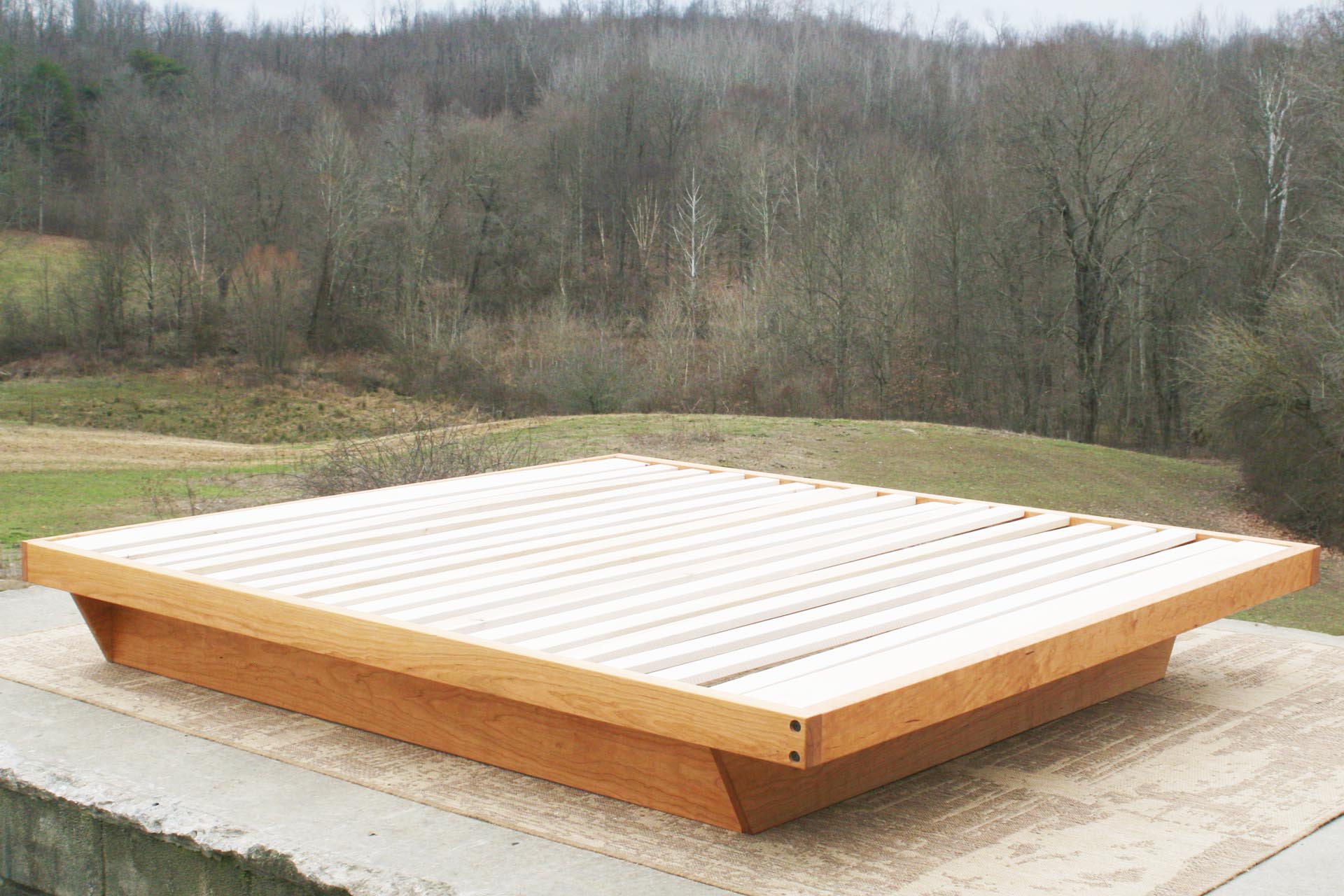 custom cherry wood low platform bed frame top angle view