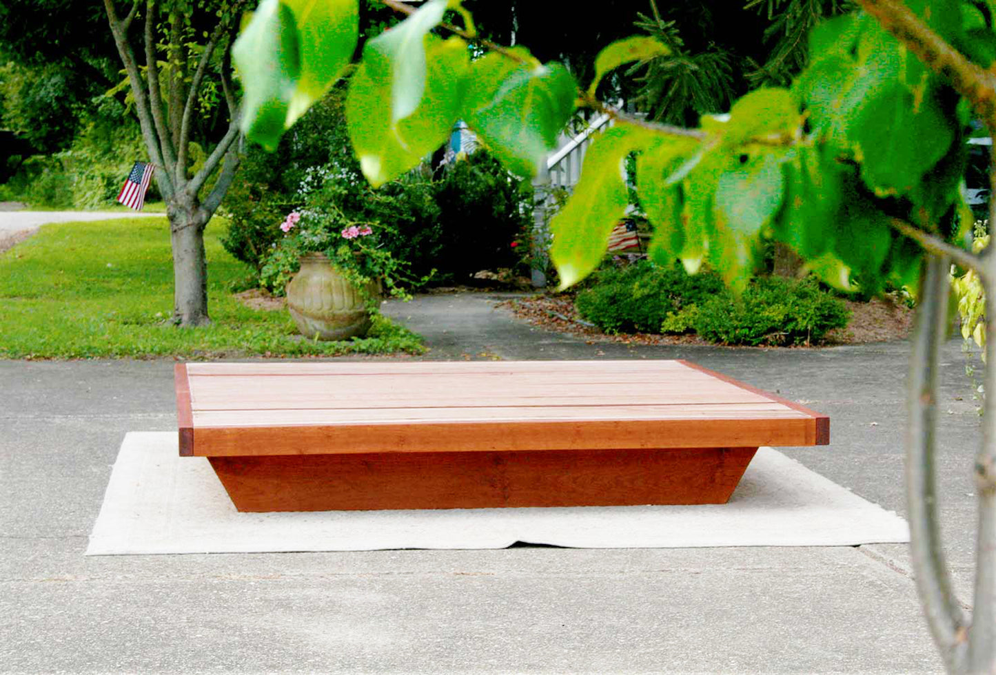 low platform bed frame in cherry wood front view