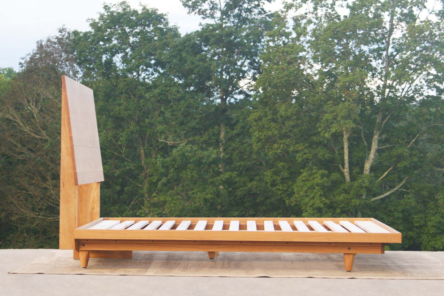 side view natural walnut Mid Century Platform Bed with Slanted Headboard