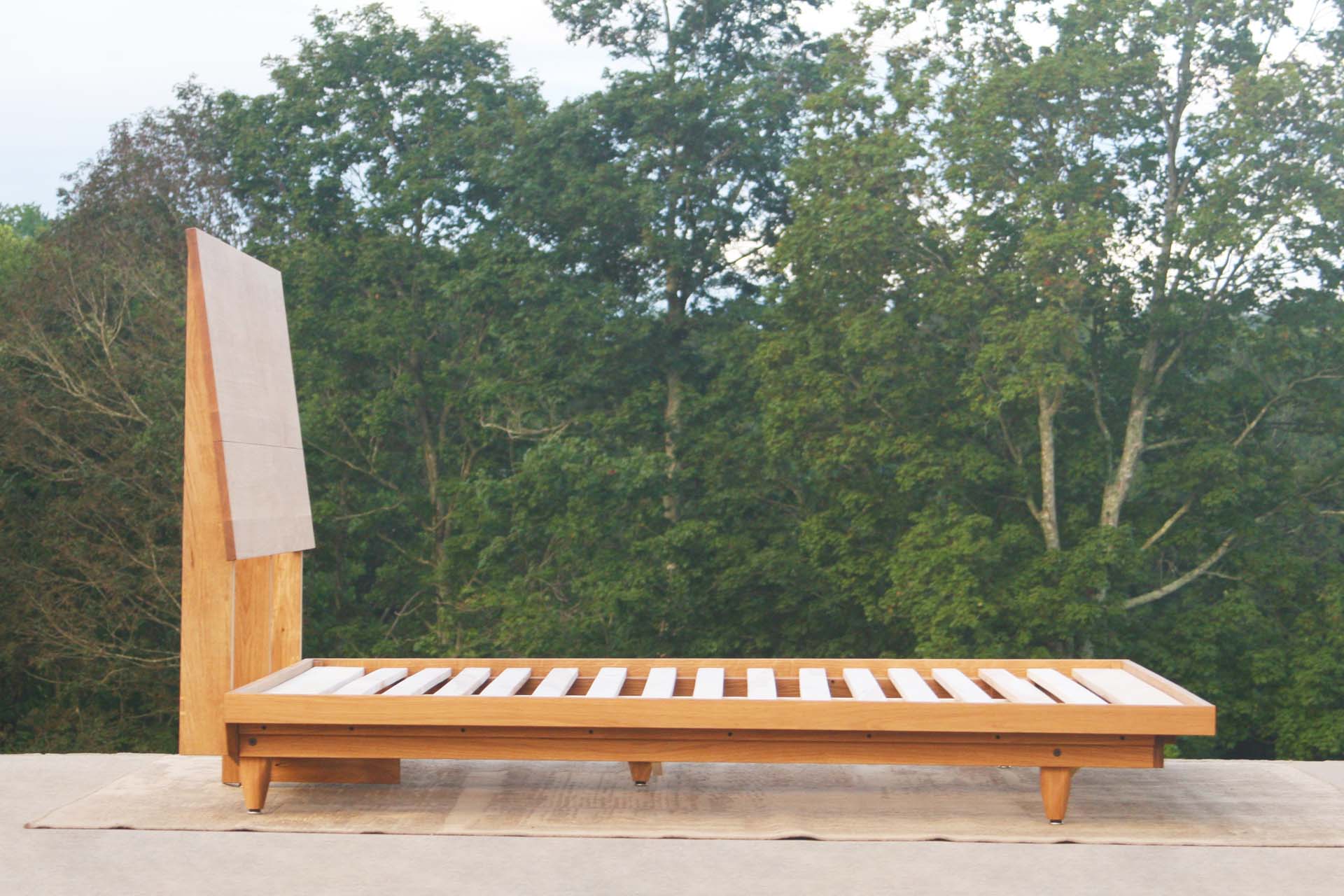side view natural walnut Mid Century Platform Bed with Slanted Headboard
