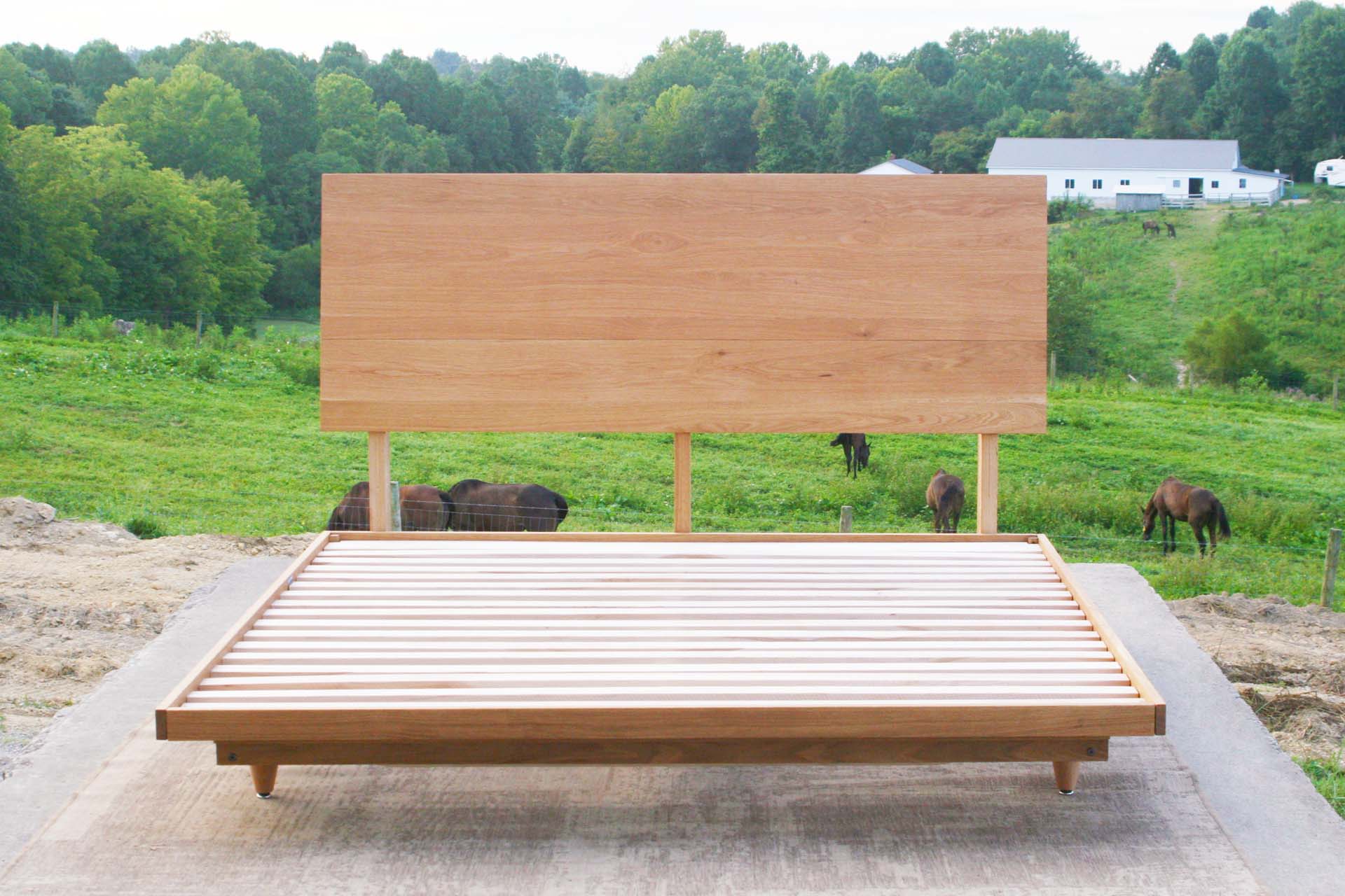front view natural walnut Mid Century Platform Bed with Slanted Headboard