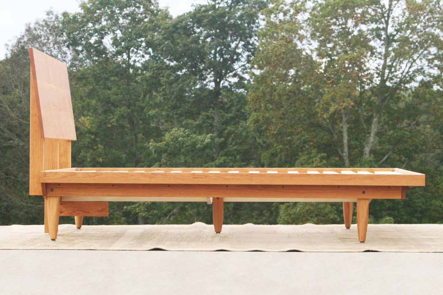 side view natural Mid Century Platform Bed with Slanted Headboard