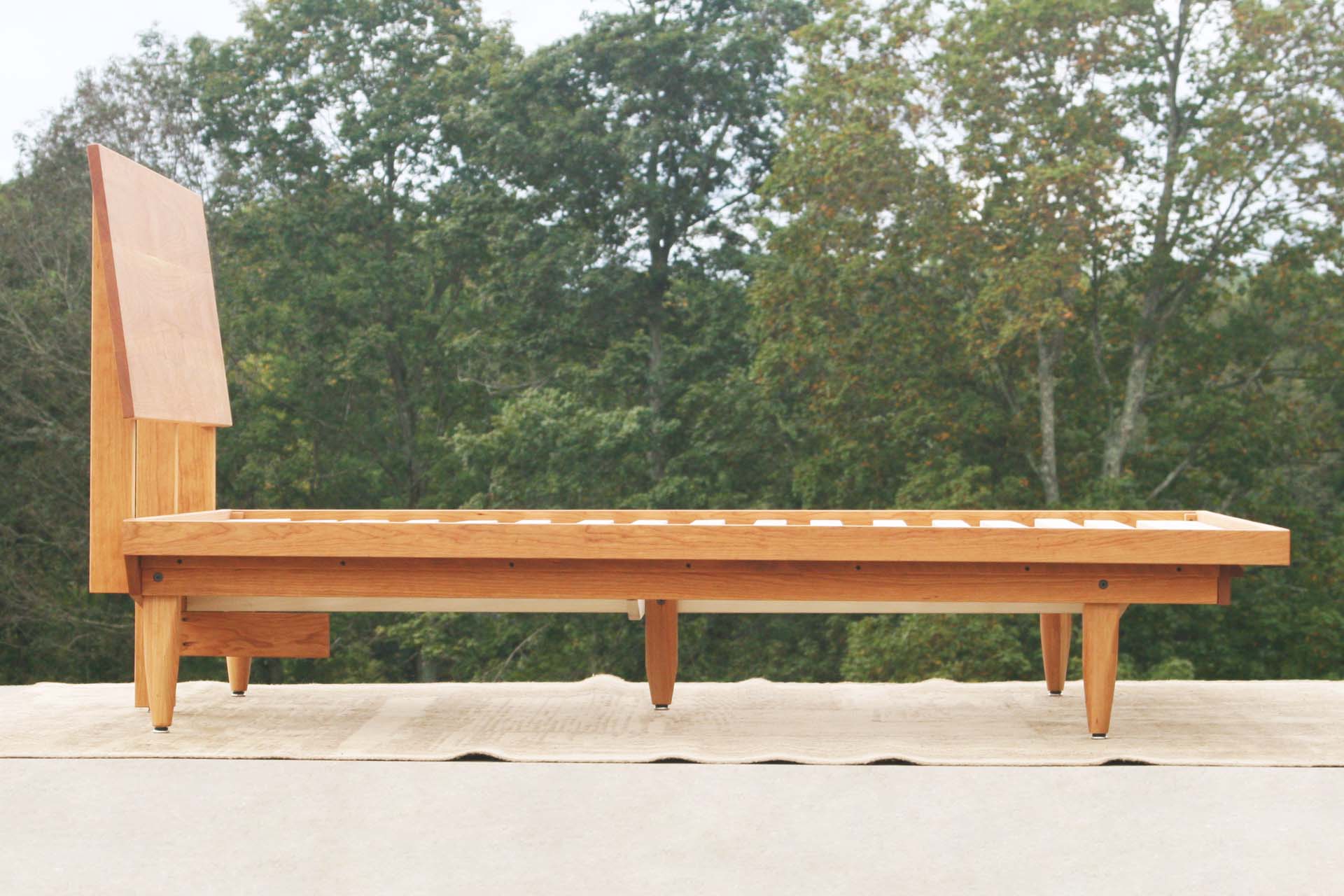 side view natural Mid Century Platform Bed with Slanted Headboard