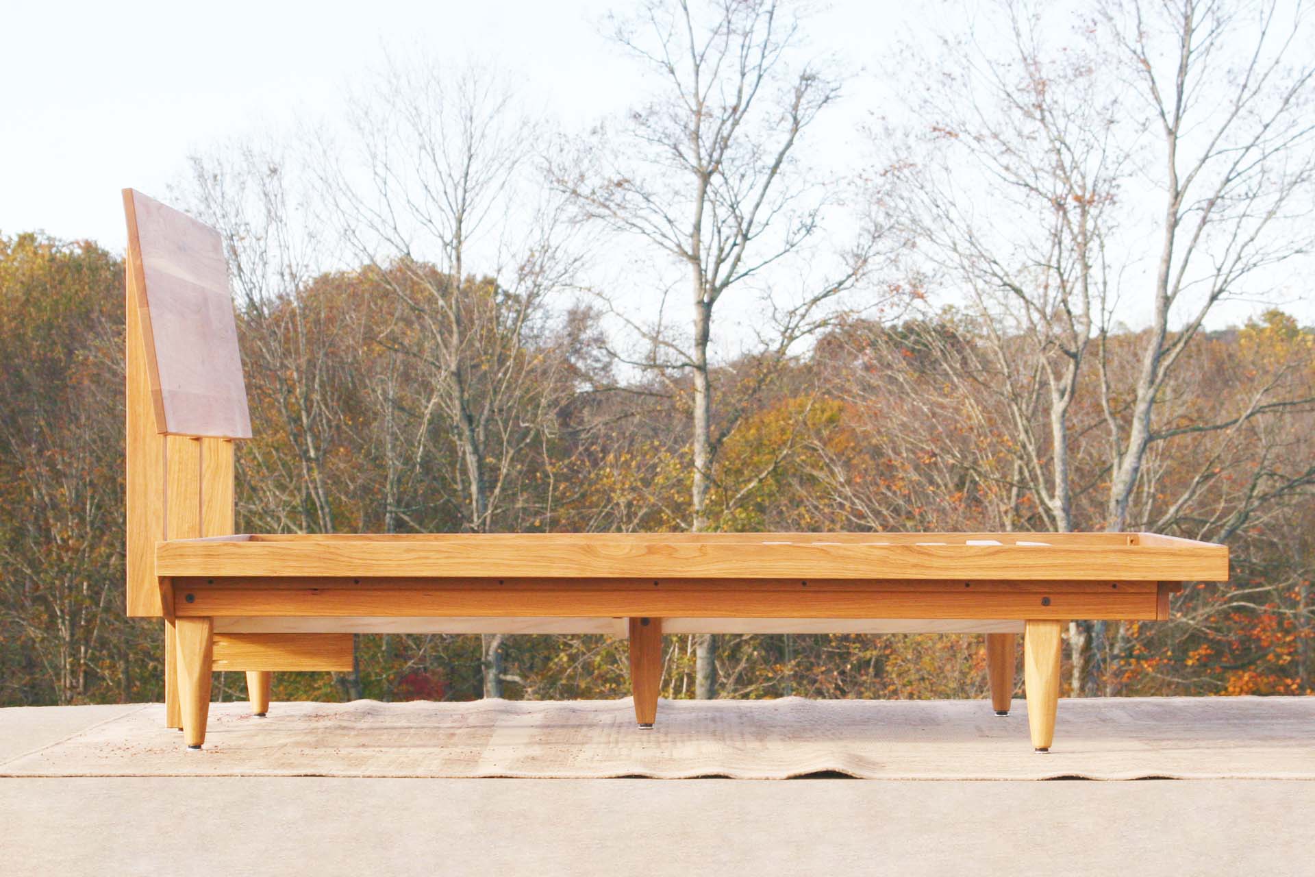 side view custom Mid Century Platform Bed with Slanted Headboard