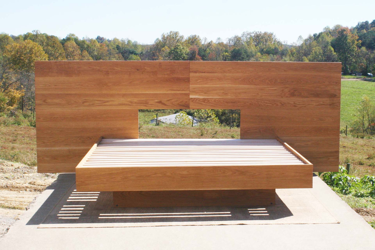 wide Cantilever bed with large headboard
