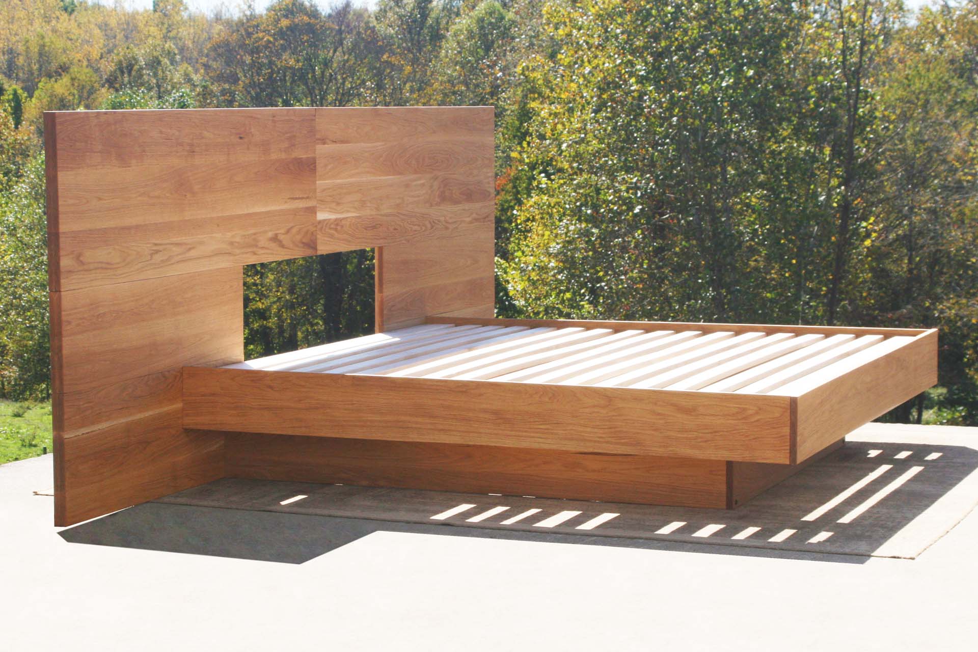 angled view wide Cantilever bed with large headboard
