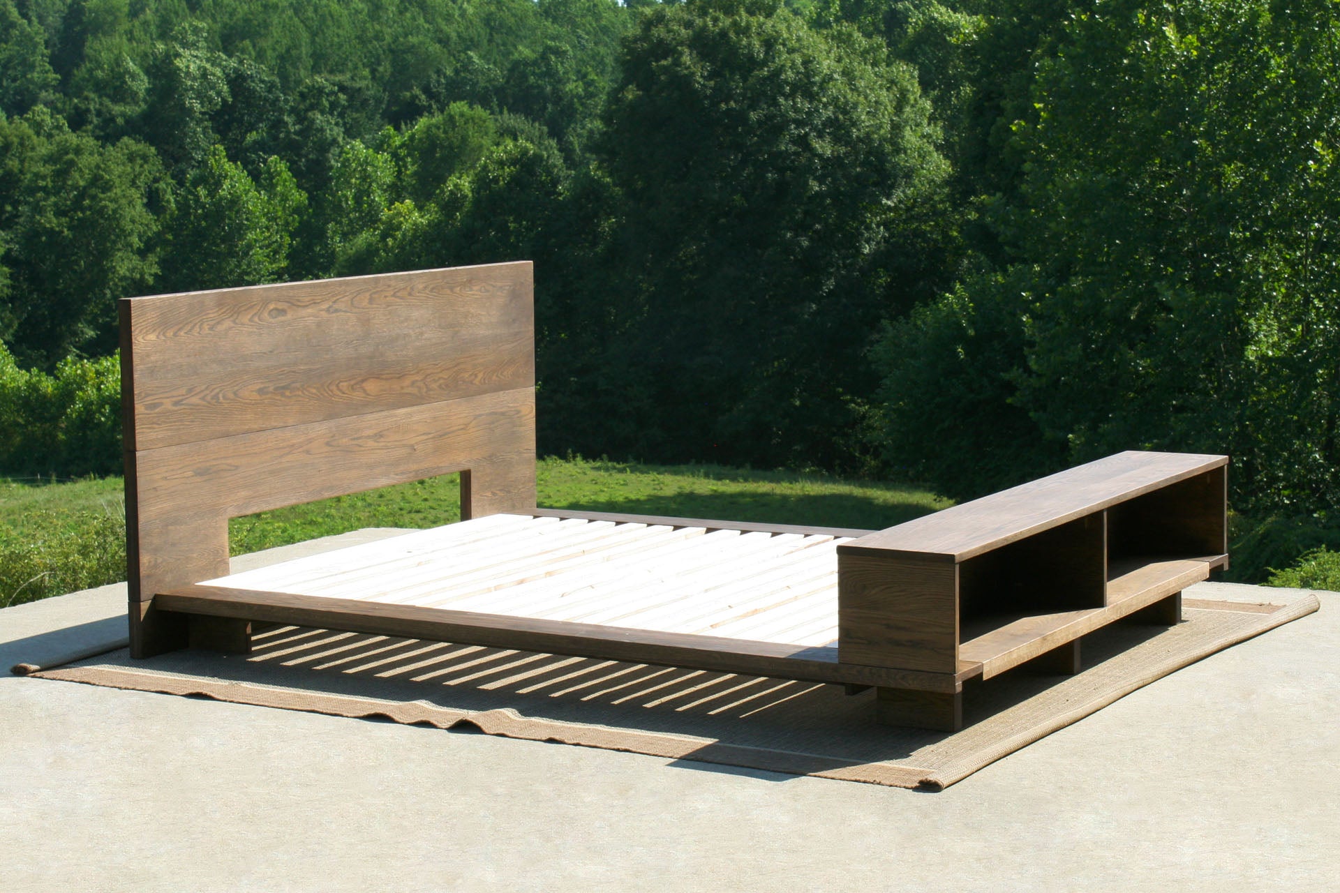 angled view Low platform bed with bookcase foot-end