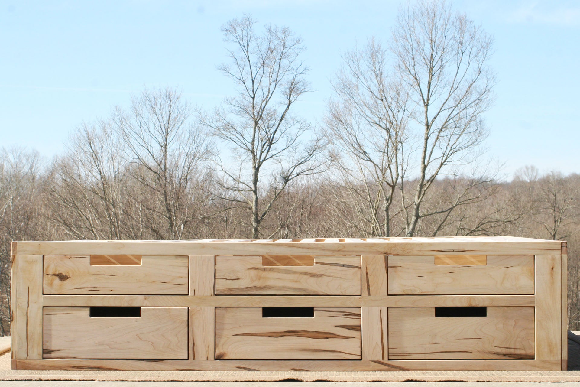 side view wood Mates bed with 6 drawers on 1 side