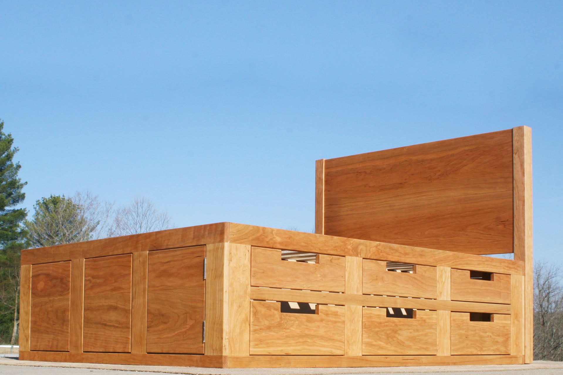 low angled view Mates bed with 6 drawers on 1 side wood
