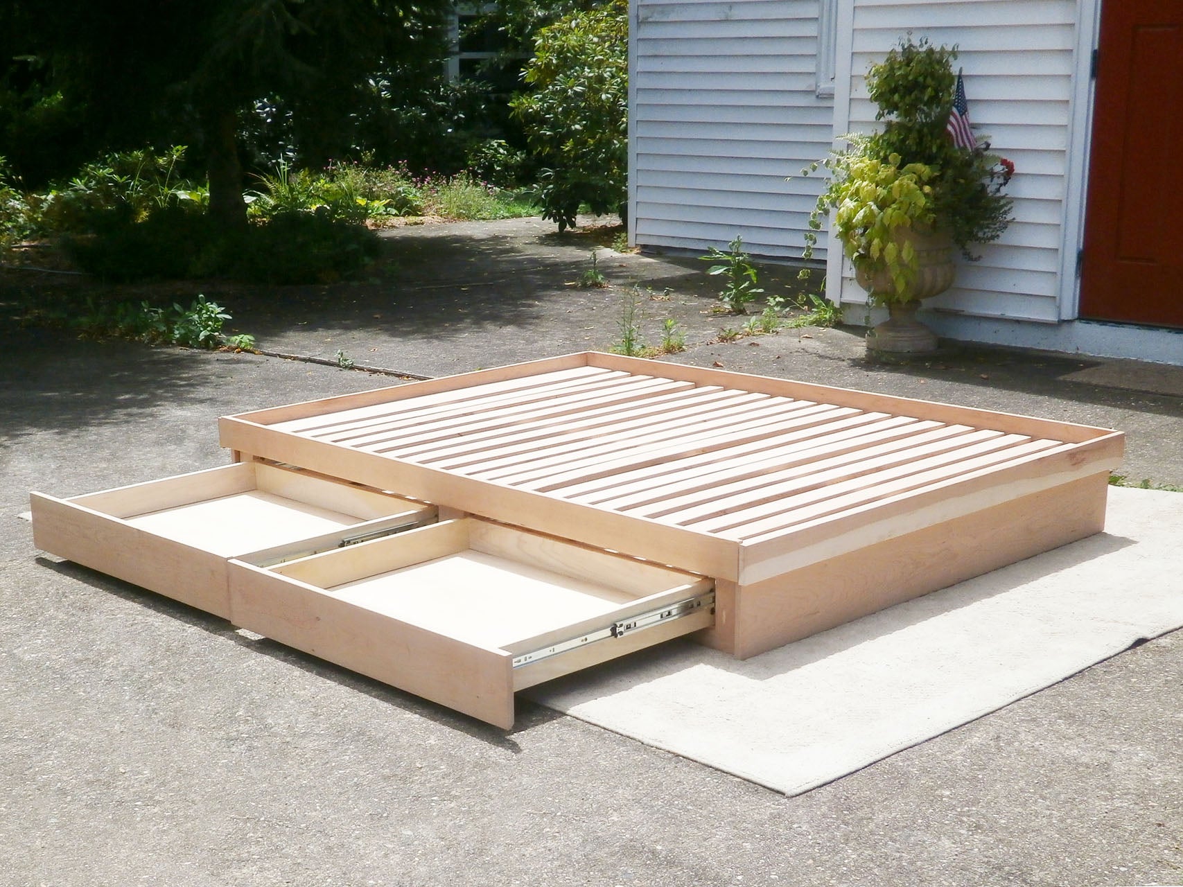 wood Low storage bed with 4 drawers 2 drawers out