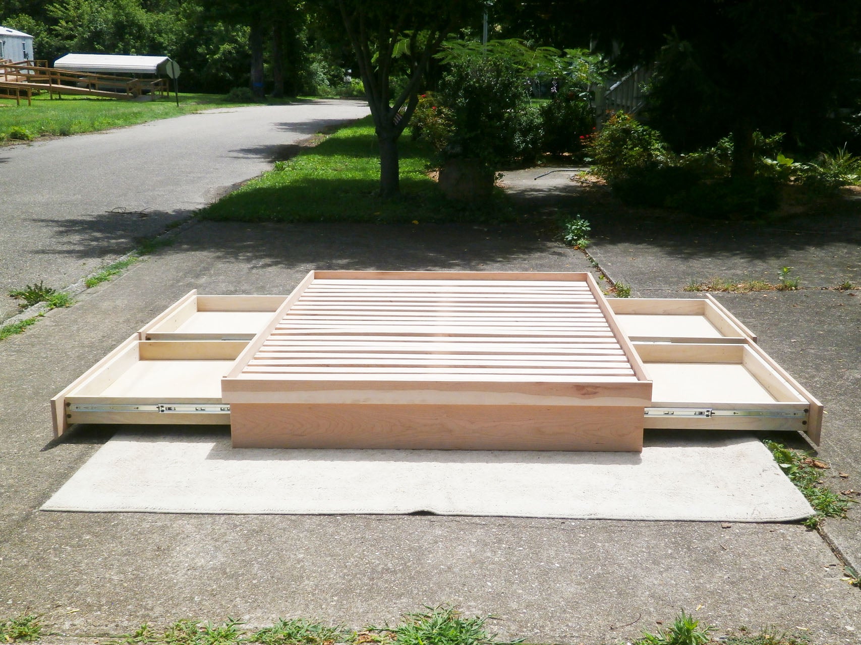 wood Low storage bed with 4 drawers out