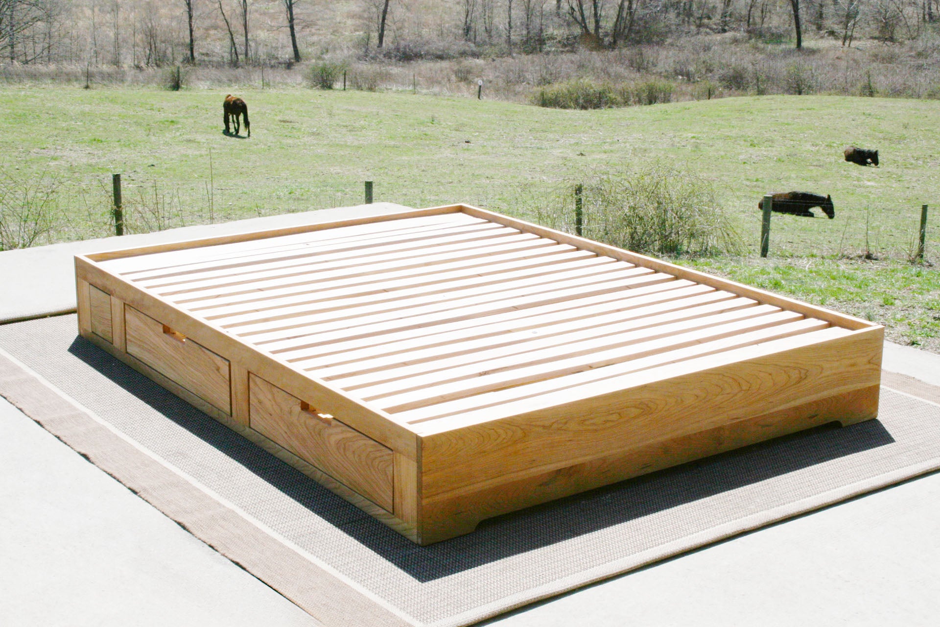 angled view Low profile storage bed with 4 drawers