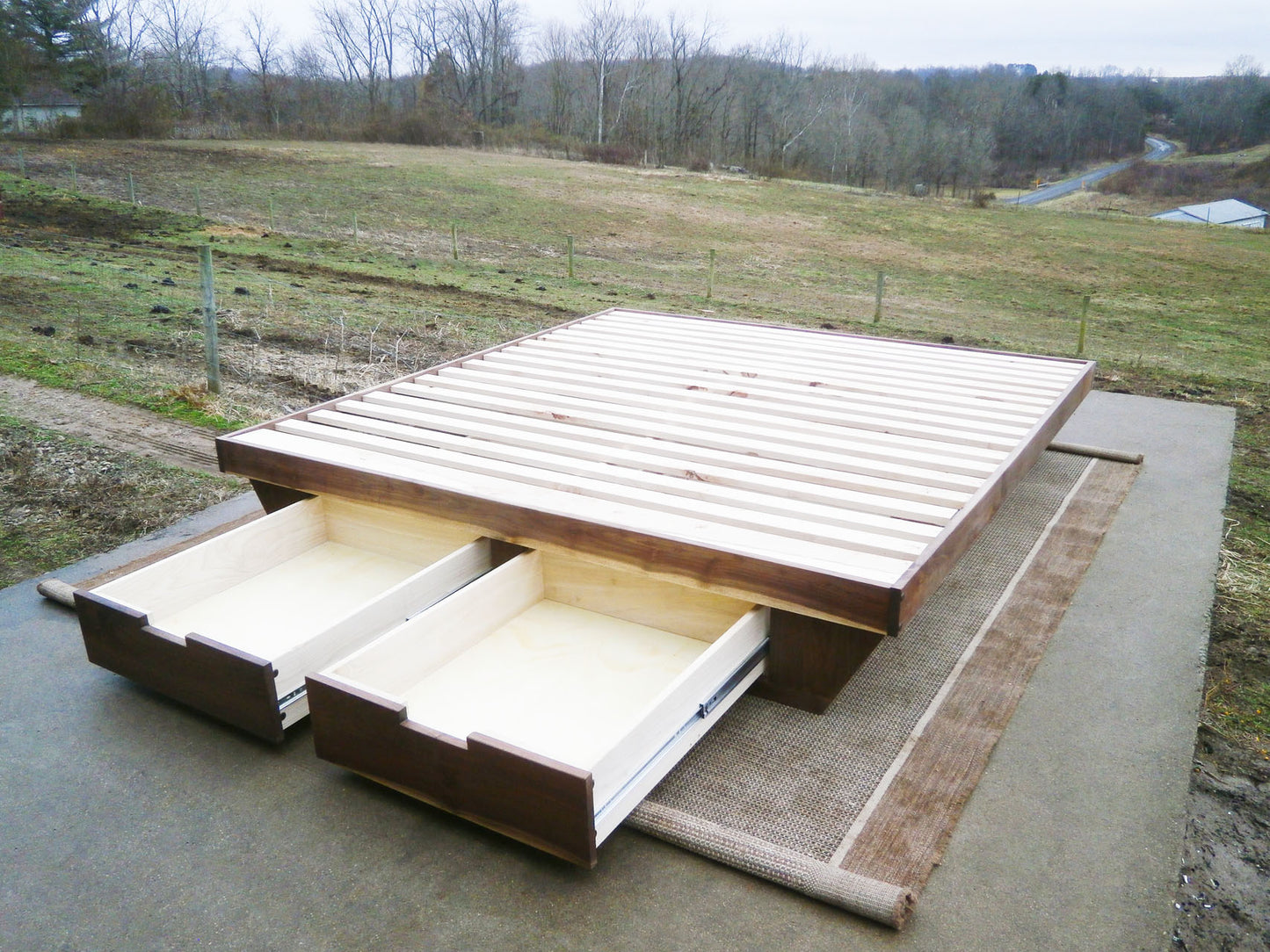 drawers open low Platform Bed with angled base and 2 drawers