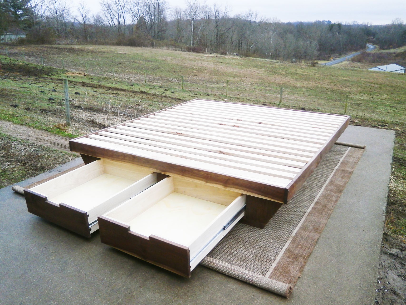 drawers open low Platform Bed with angled base and 2 drawers