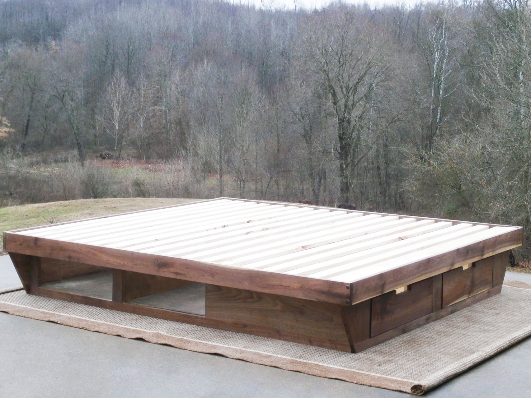 angled view low Platform Bed with angled base and 2 drawers
