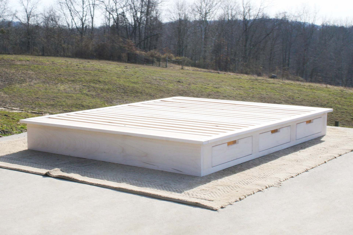 angled view solid natural Low Platform Bed or Tatami Bed with 6 drawers