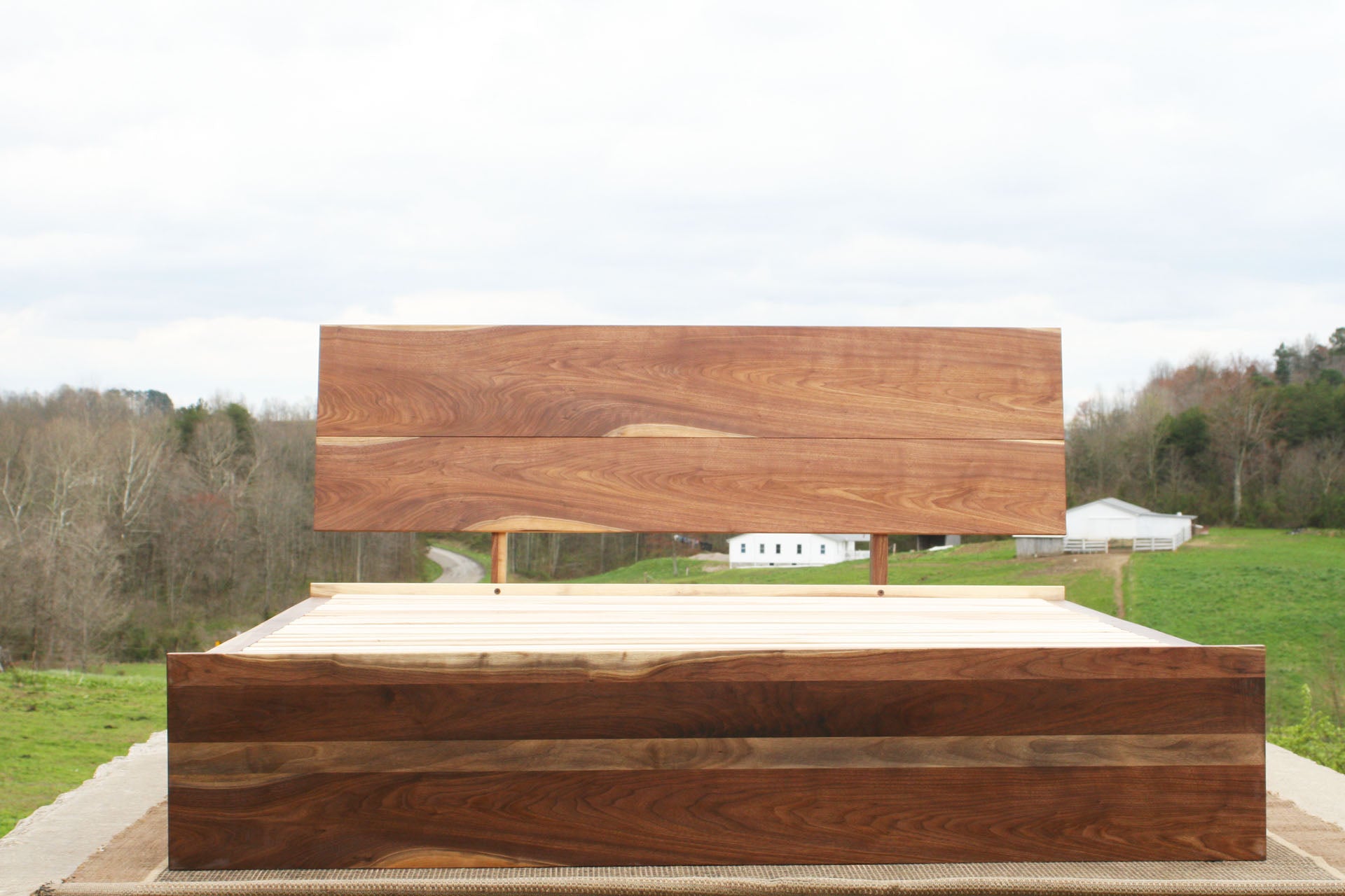 front view walnut Low Storage Bed with 6 drawers and angled headboard