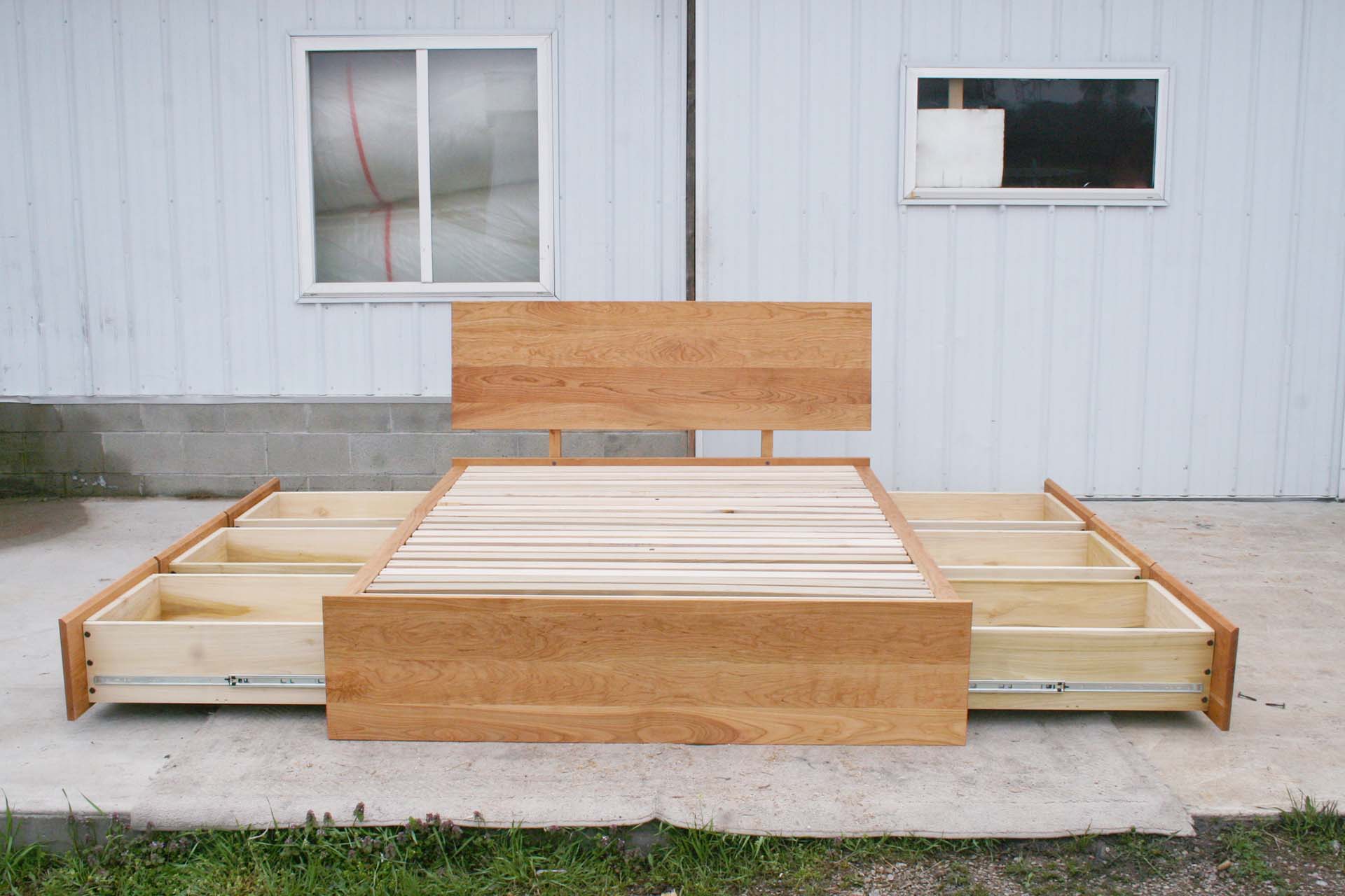front view drawers out natural Low Storage Bed with 6 drawers and angled headboard