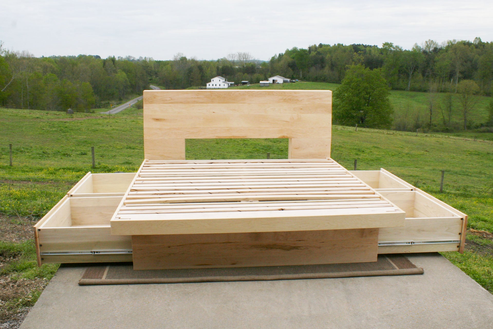 front view Four drawer storage bed with headboard storage with drawers open