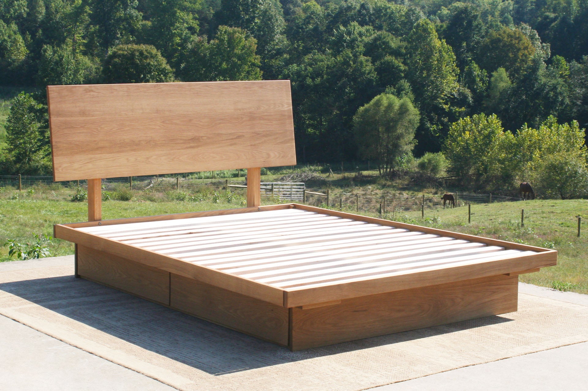 low platform storage bed with 4 drawers angled view