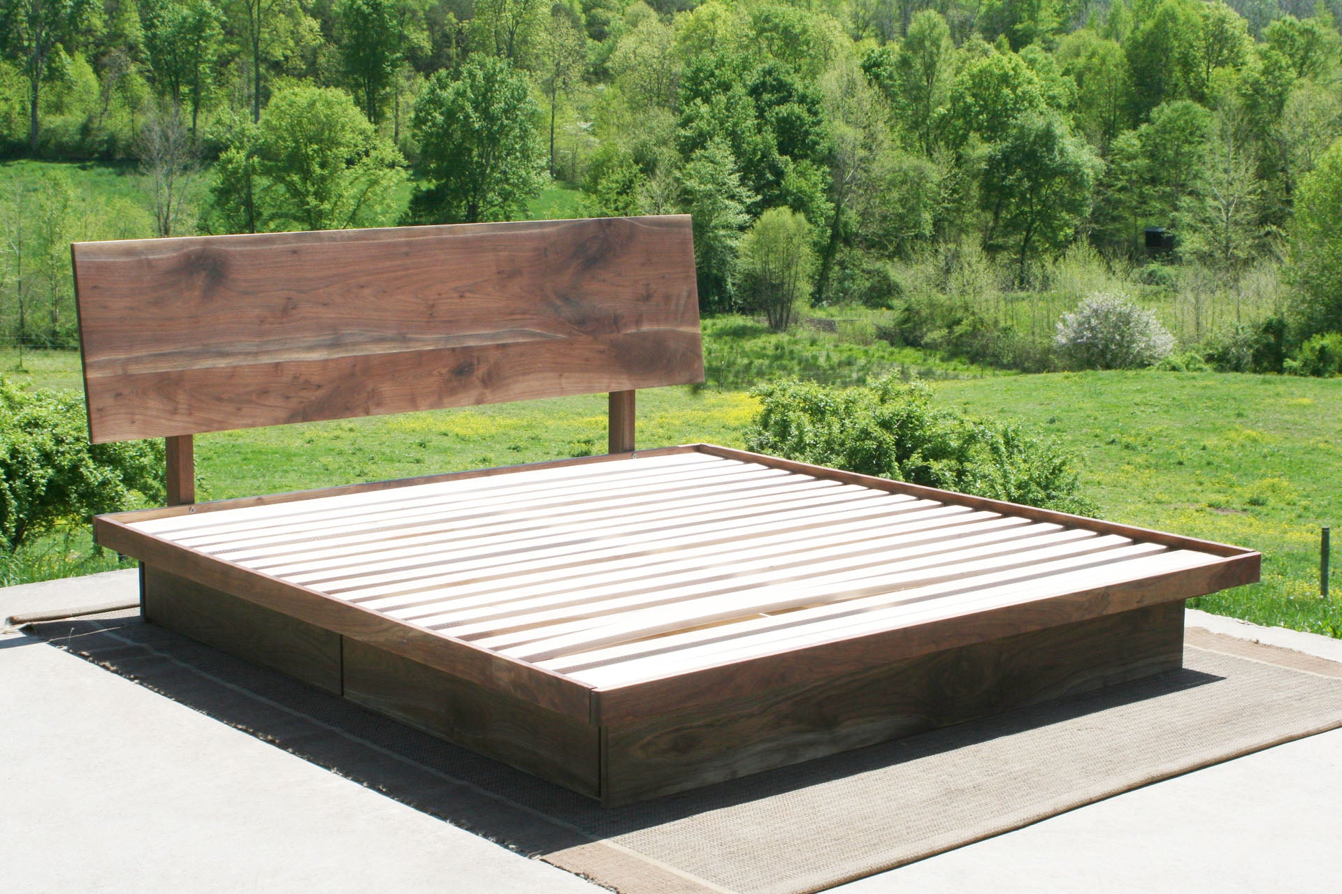 angled view Low platform storage bed with 4 drawers