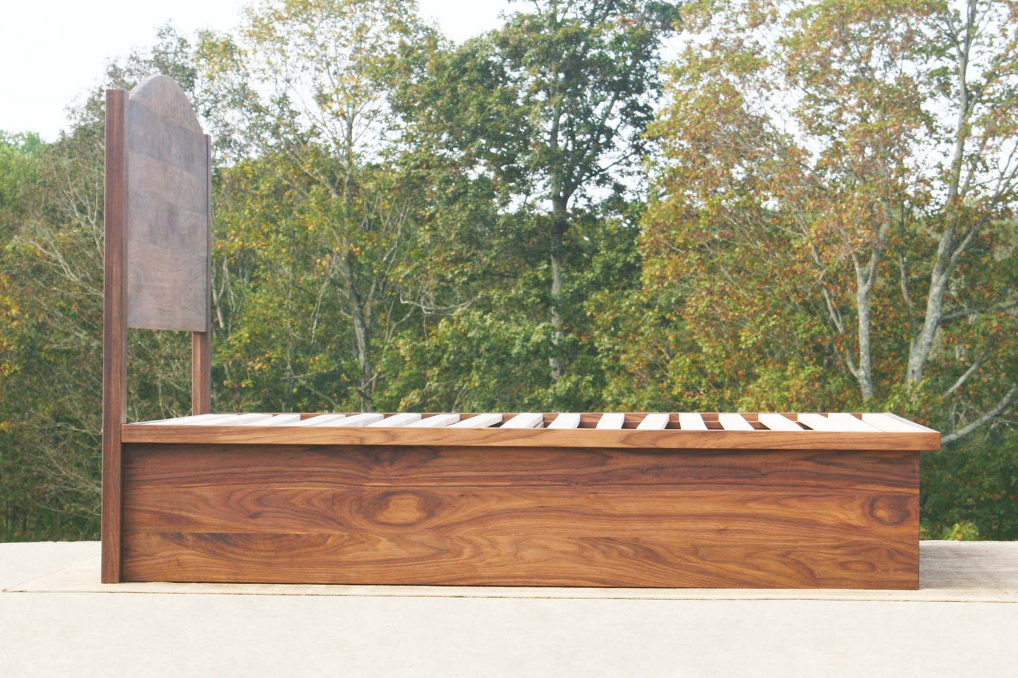 side view custom Platform bed with 4 drawers and headboard with top bar