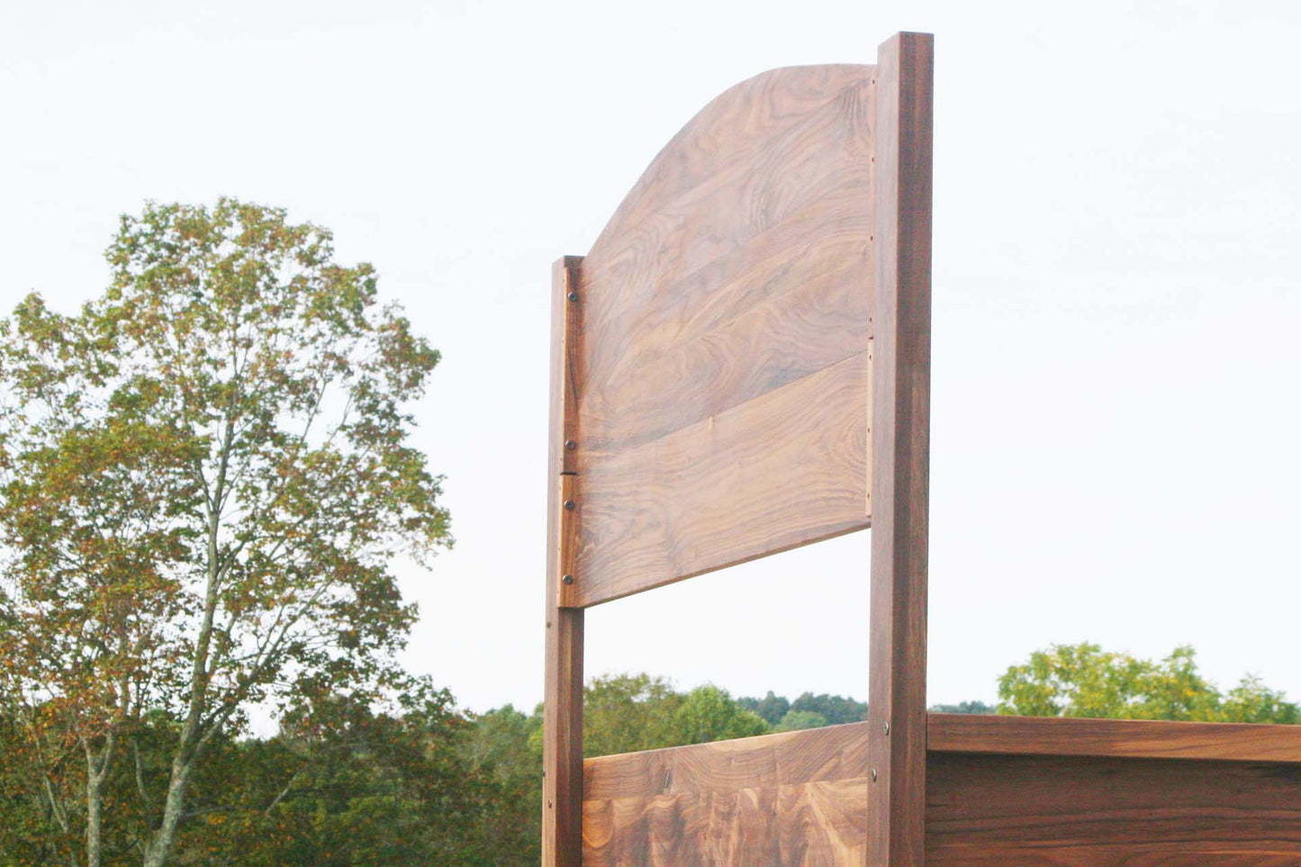 back of headboard of custom Platform bed with 4 drawers and headboard with top bar