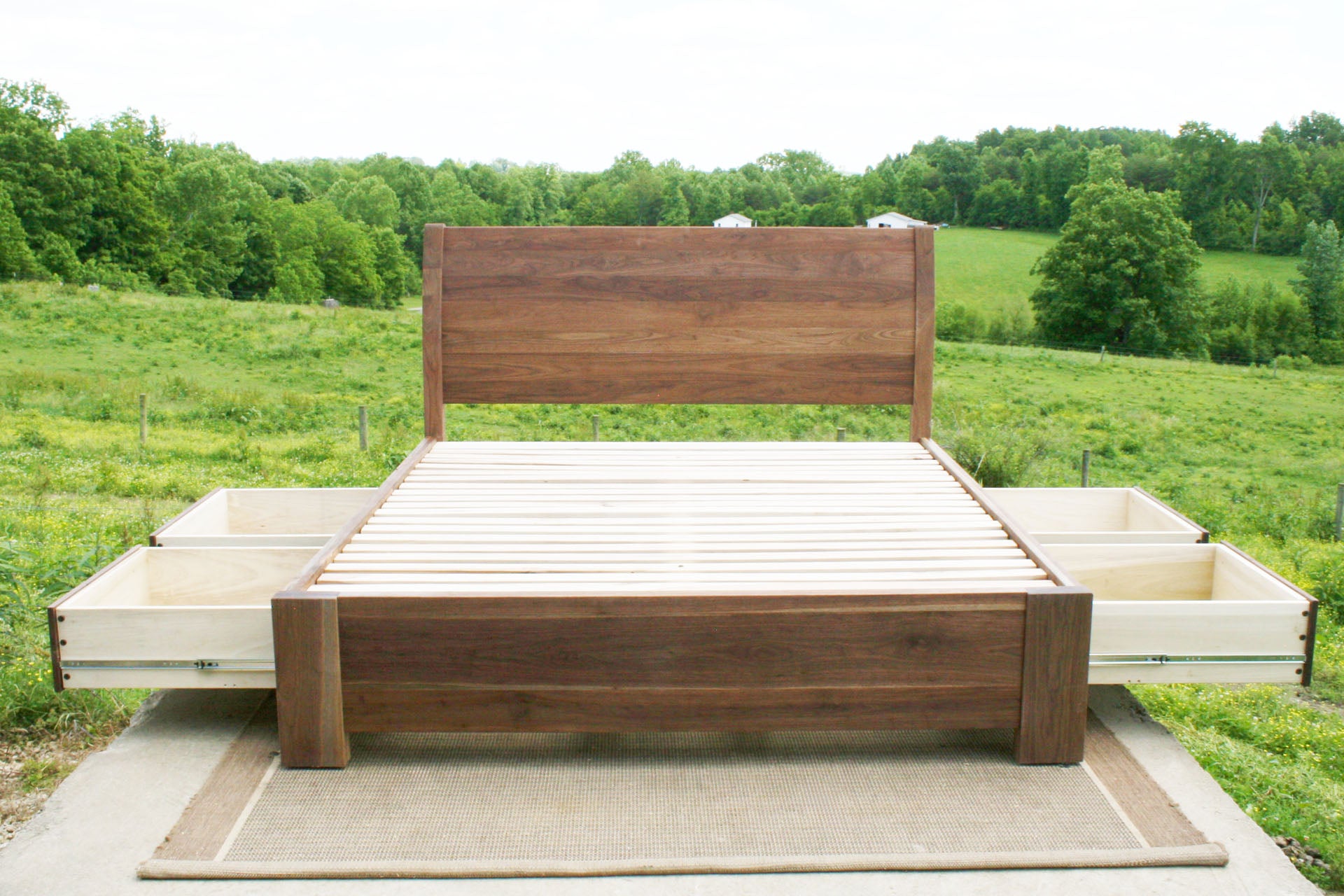 front view drawers out Sleigh Platform bed with 4 drawers and large posts