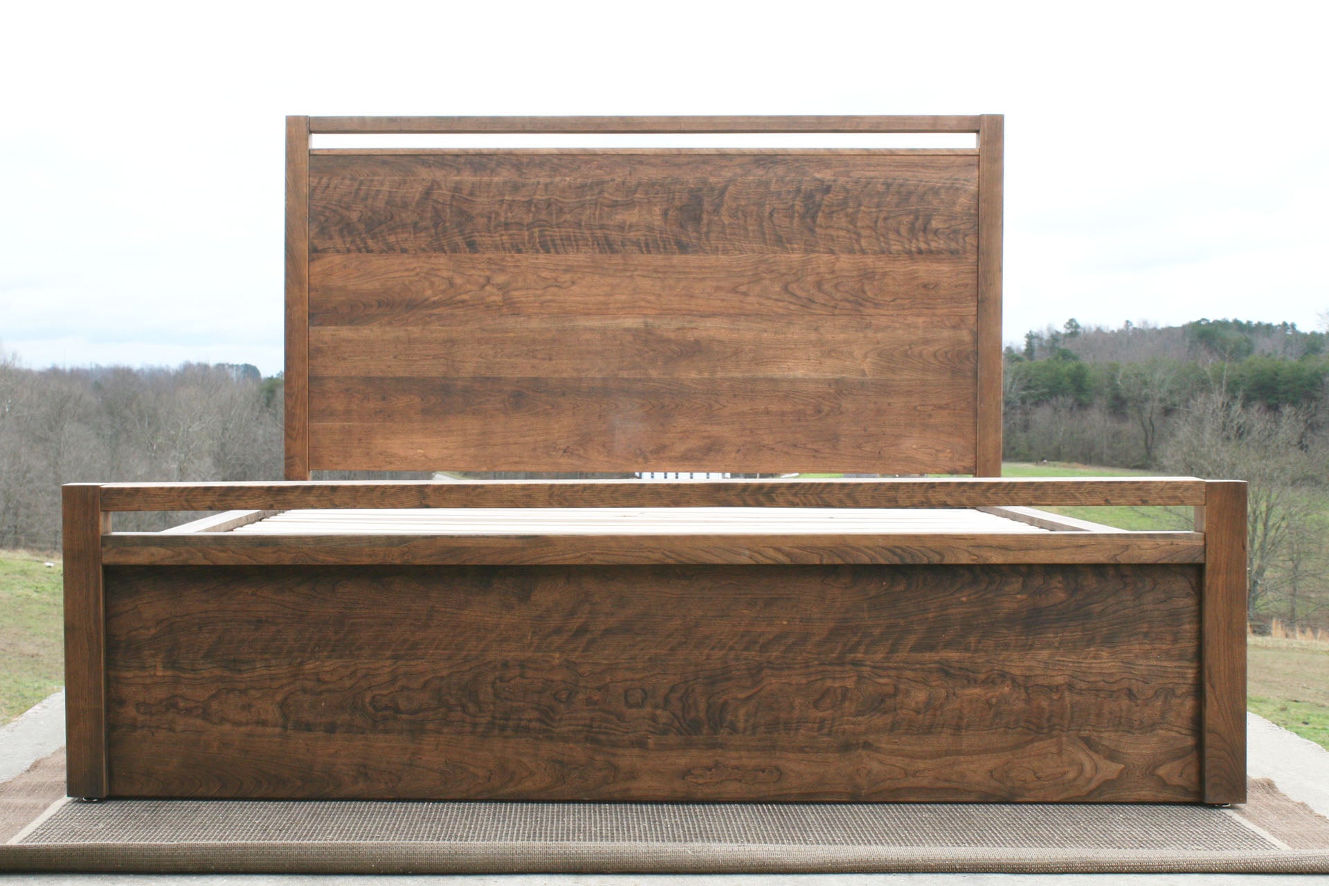 low front view natural hardwood Storage Bed with top-rail head and footboard
