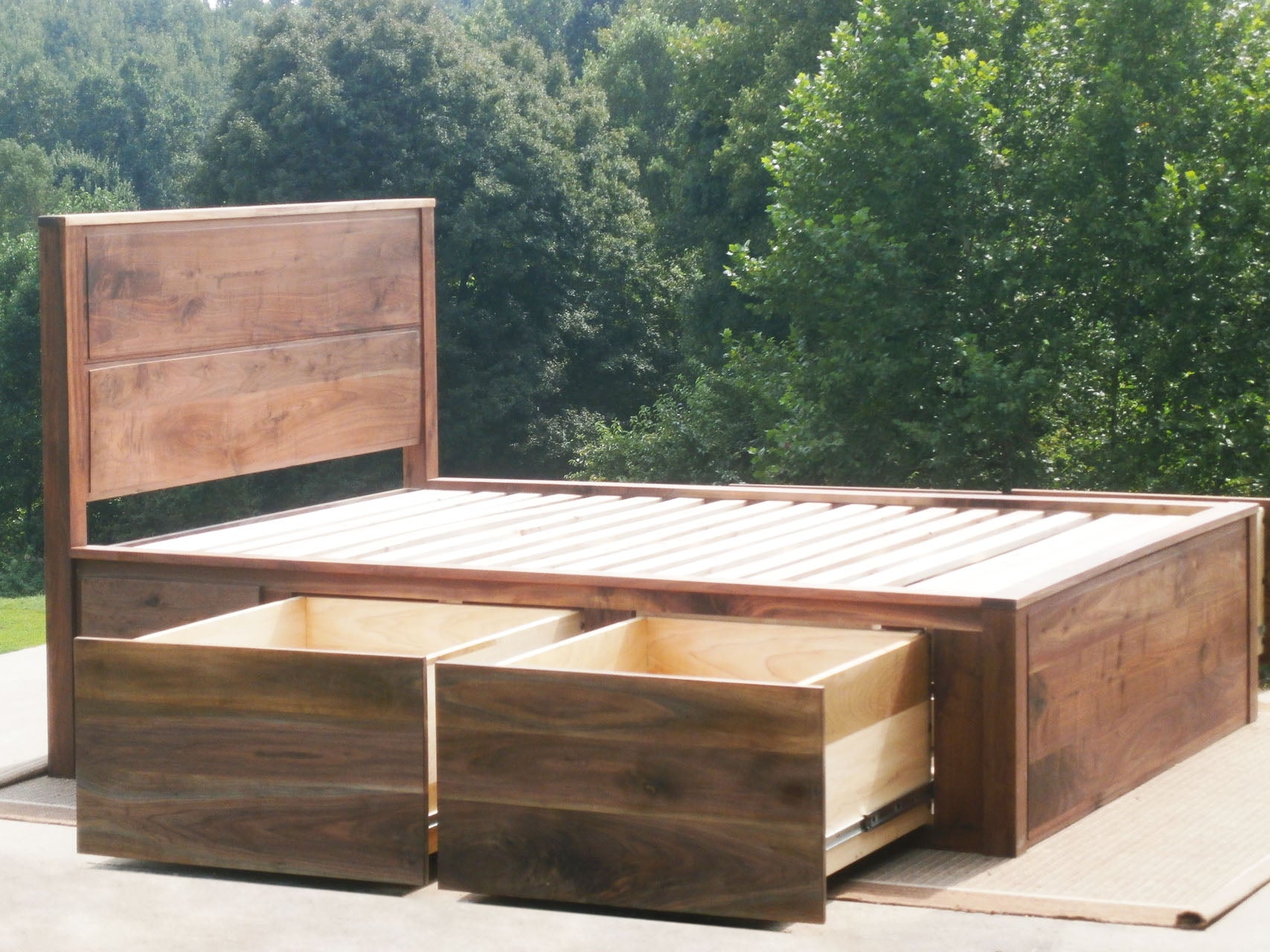 side view drawers open natural Storage Bed with 4 drawers, recessed frame headboard and toe kick