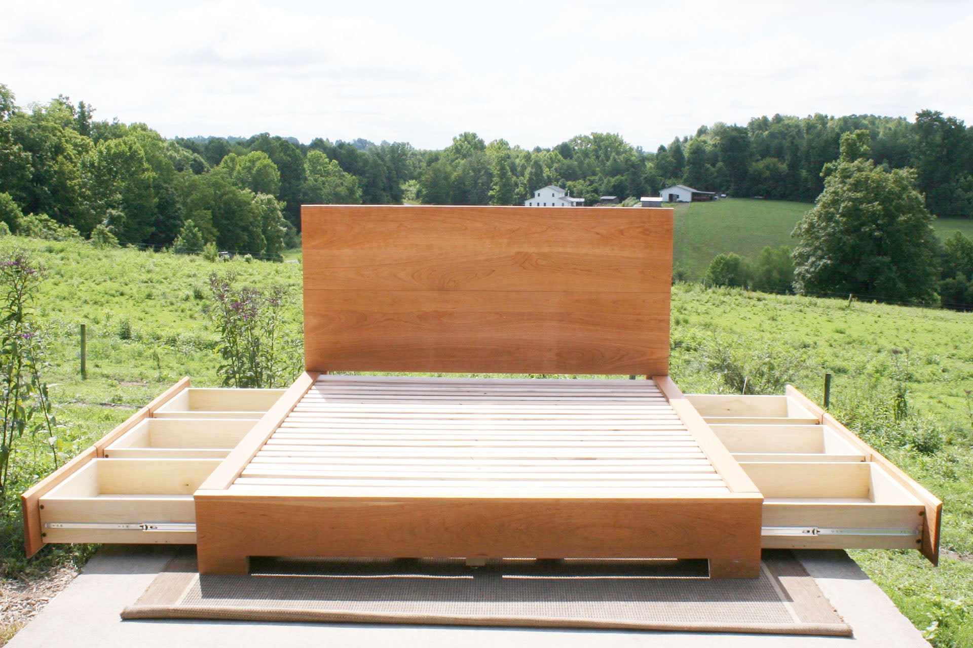 Low Storage Bed with 6 drawers open and thick headboard