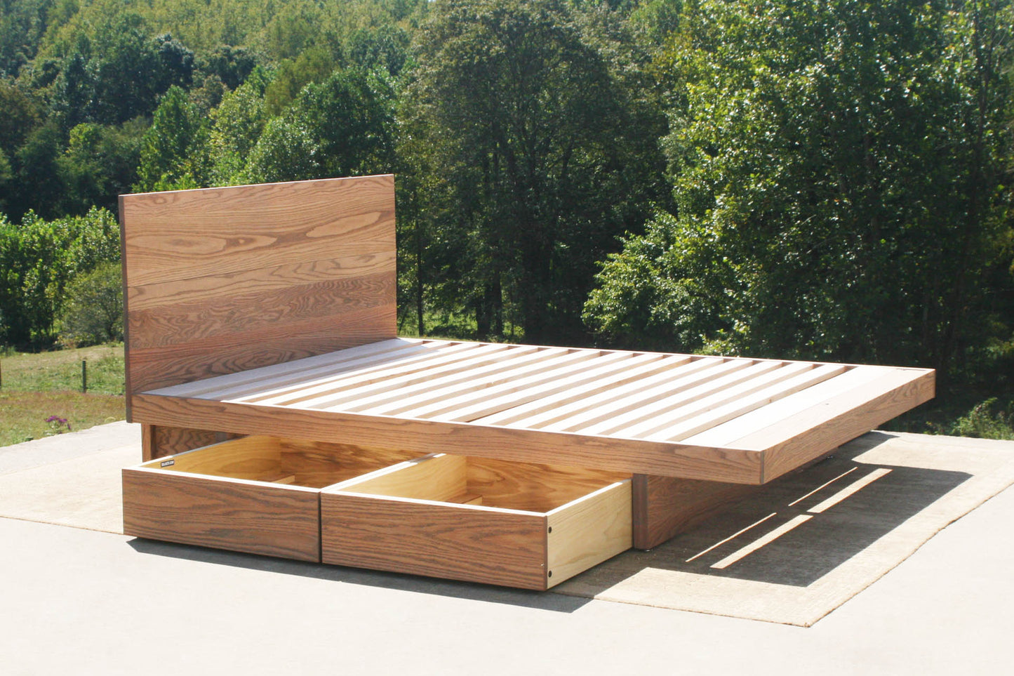 angled view drawers open custom Cantilever storage bed with 4 drawers and headboard