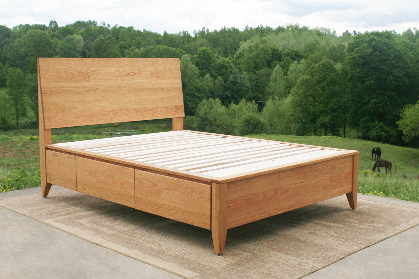 angled view Platform storage bed with headboard