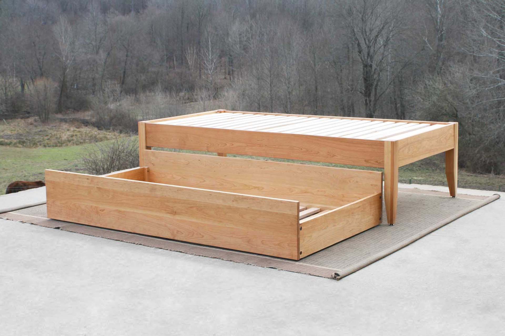 angled view trundle out hardwood natural Simply Elegant Platform Bed with Trundle