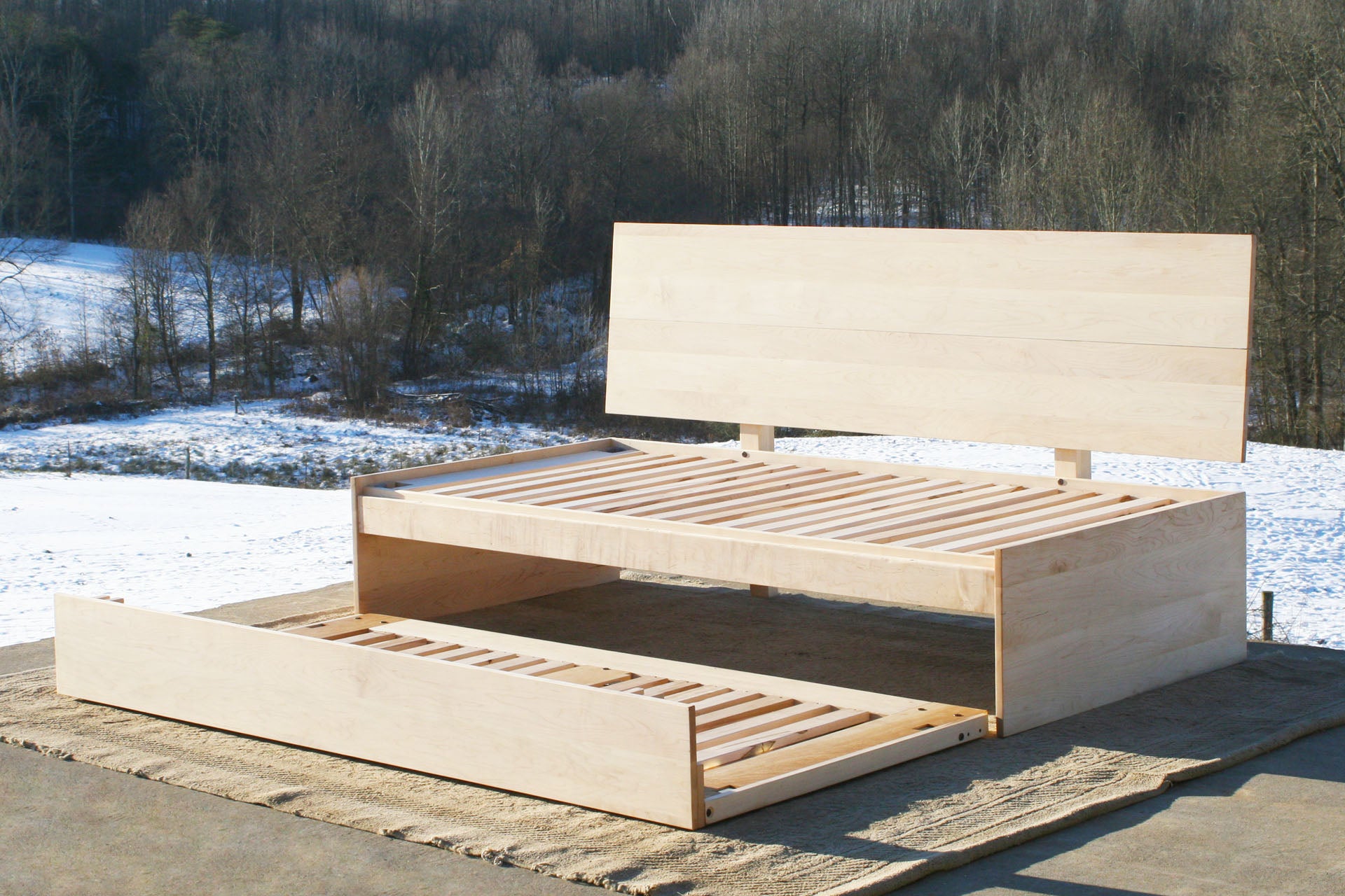 angled view daybed with pop up trundle