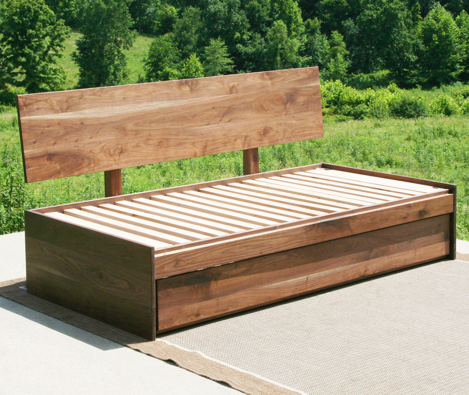 walnut daybed with pop up trundle side view