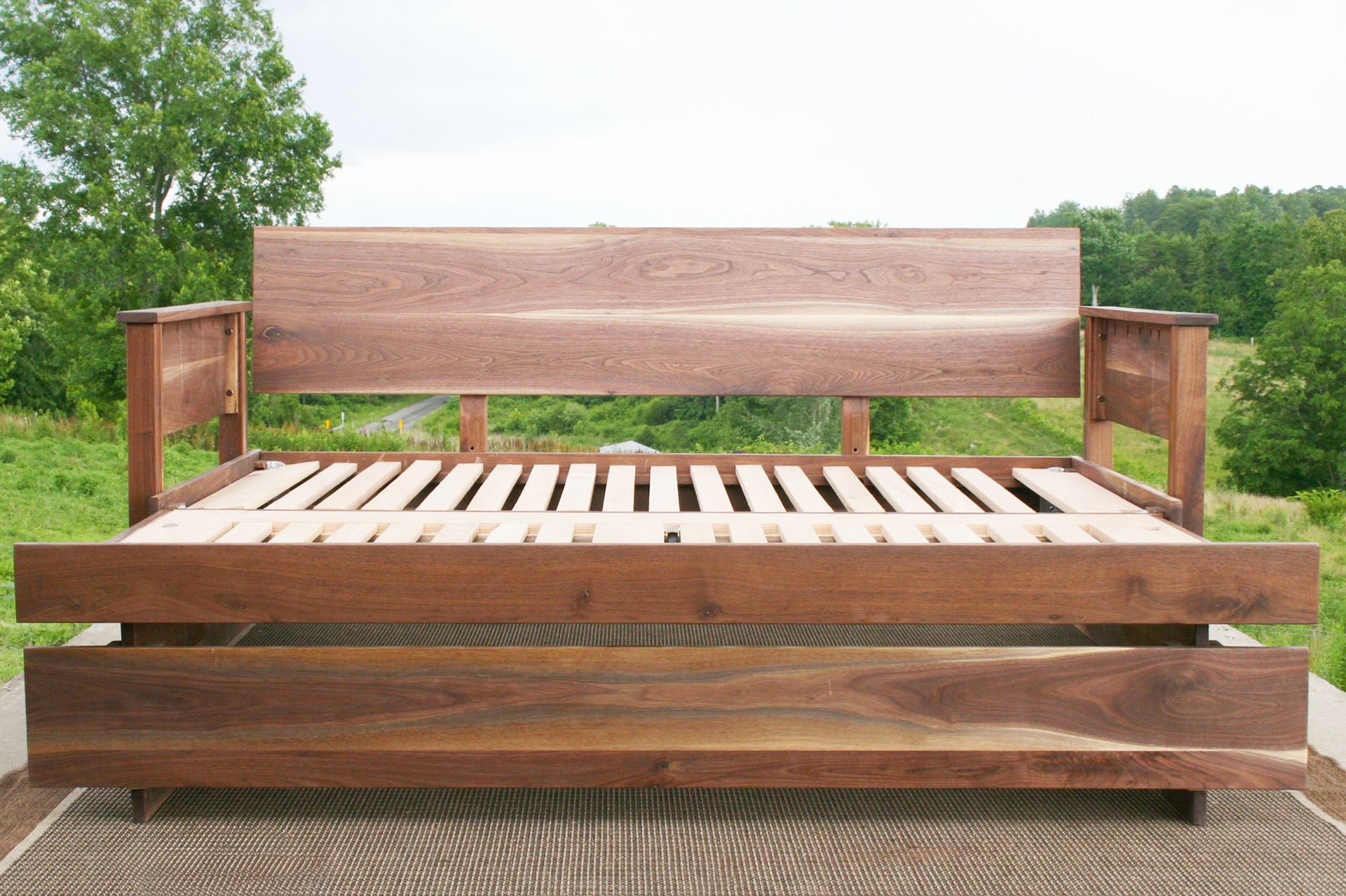 walnut daybed with pop up trundle fully extended front view